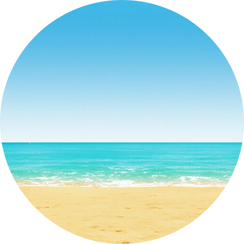 Circular image of a beach with blue sky and ocean.